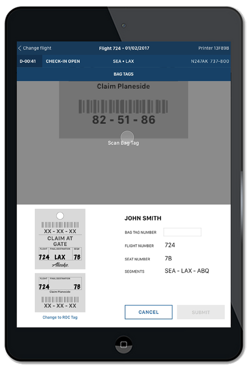 Gate-checking a bag: a printed luggage tag preview on the iPad mini.